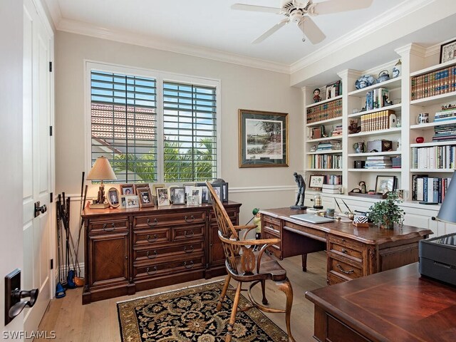 office with ornamental molding, wood finished floors, and a ceiling fan