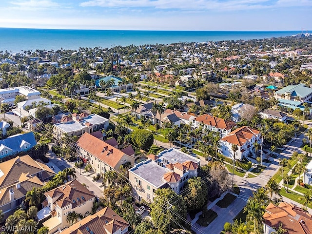 bird's eye view with a residential view and a water view