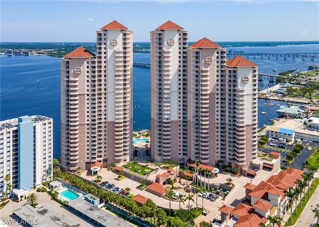 drone / aerial view with a water view