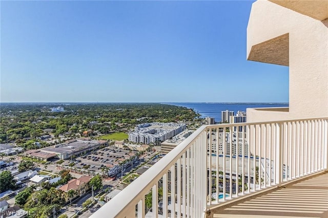 balcony featuring a water view