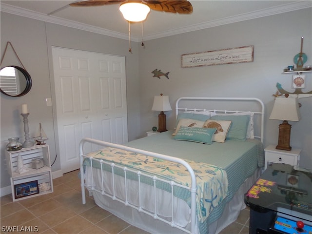 bedroom with light tile flooring, a closet, ceiling fan, and crown molding