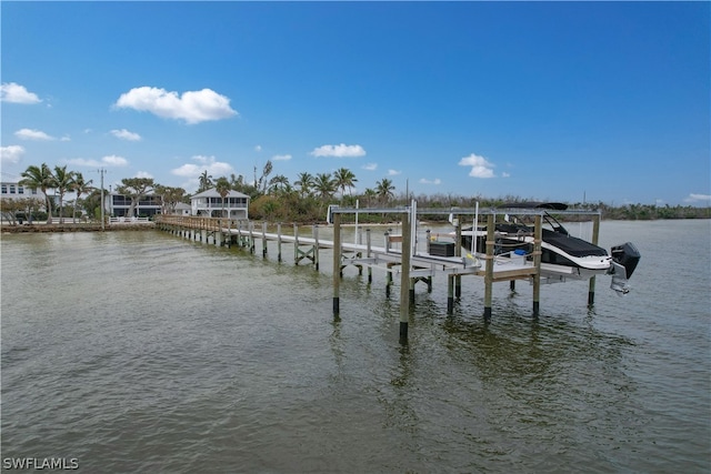 view of dock with a water view