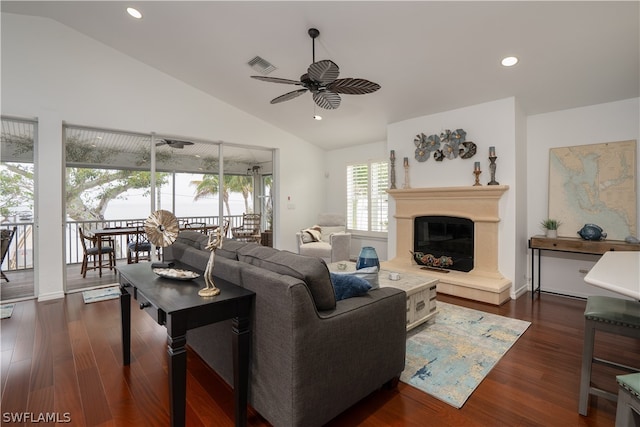 living room featuring high vaulted ceiling, dark hardwood / wood-style floors, and ceiling fan