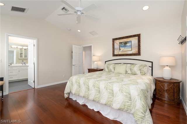 bedroom featuring ceiling fan, lofted ceiling, dark hardwood / wood-style flooring, and ensuite bath