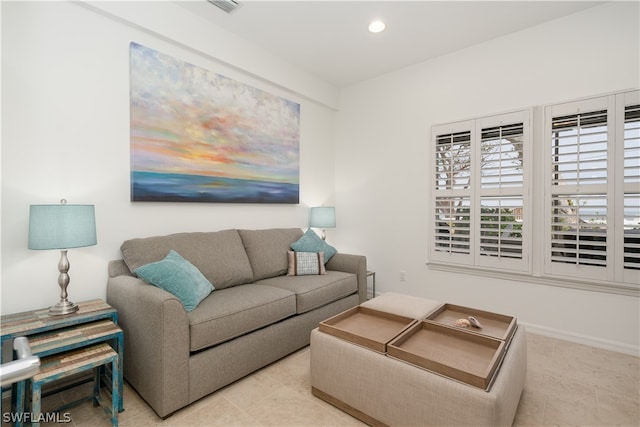 living room featuring light tile patterned flooring