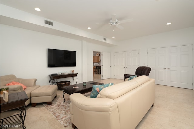 living room featuring ceiling fan