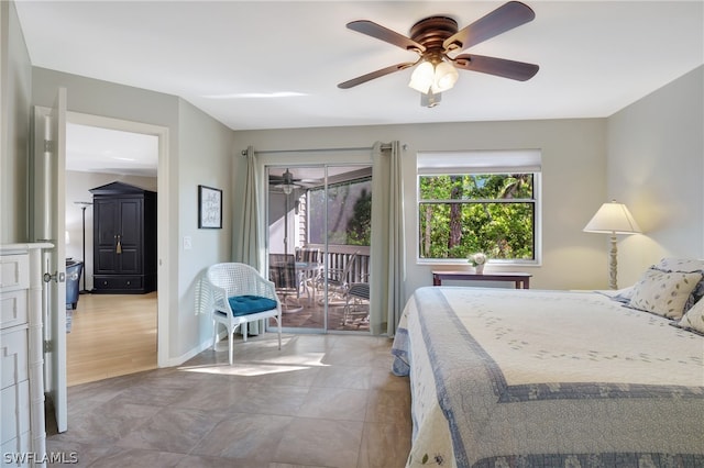 bedroom with hardwood / wood-style flooring, access to exterior, and ceiling fan