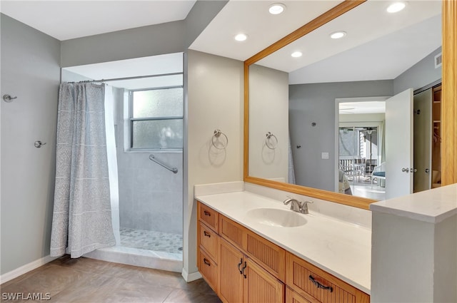 bathroom with vanity, tile patterned flooring, and a shower with shower curtain