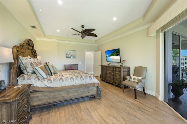 bedroom featuring access to outside, a raised ceiling, ceiling fan, and light hardwood / wood-style floors