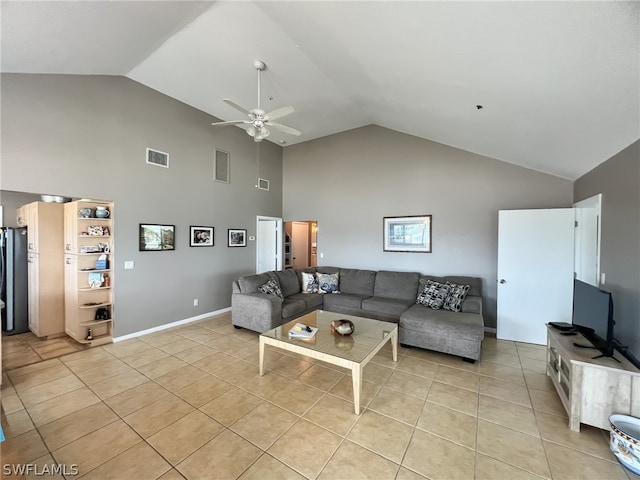 living room with light tile floors, ceiling fan, and high vaulted ceiling