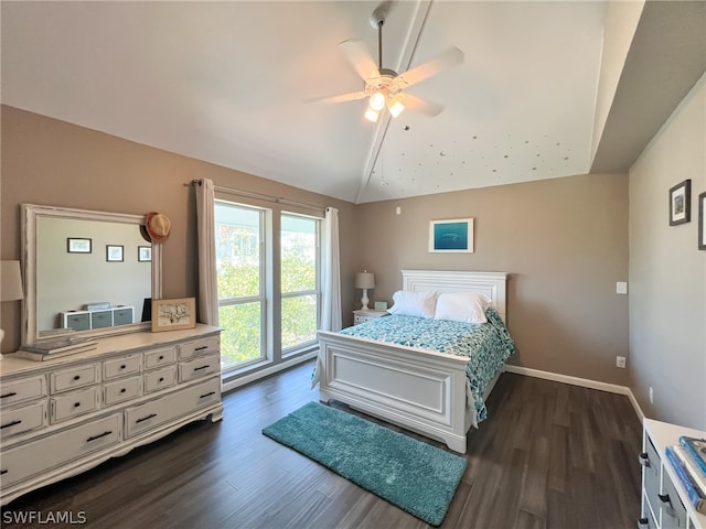 bedroom featuring ceiling fan, dark wood-type flooring, and vaulted ceiling