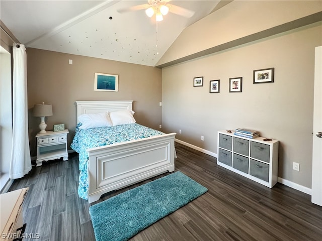 bedroom with ceiling fan, dark wood-type flooring, and lofted ceiling