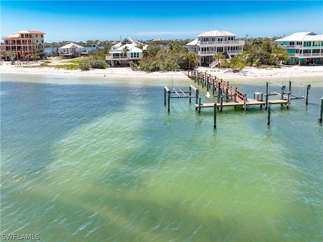 view of water feature with a dock