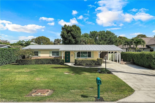 ranch-style home with a front lawn