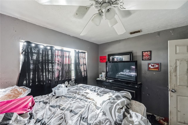 bedroom featuring ceiling fan