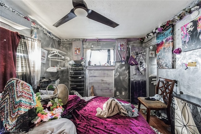 misc room with dark hardwood / wood-style flooring and ceiling fan