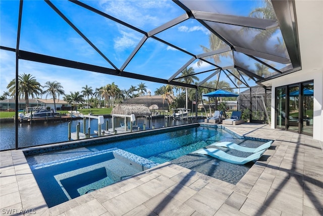 view of swimming pool with a water view, a patio, an in ground hot tub, and glass enclosure