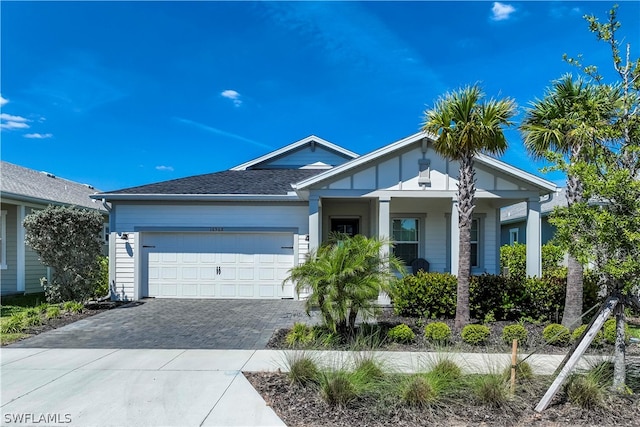 view of front of property featuring a garage