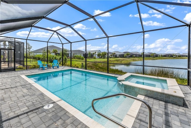 view of swimming pool featuring a patio area, a water view, an in ground hot tub, and glass enclosure