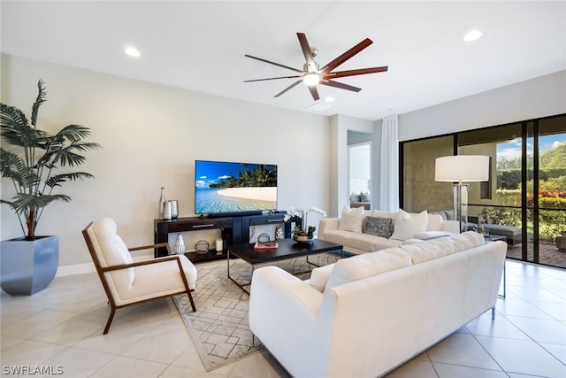 tiled living room with ceiling fan