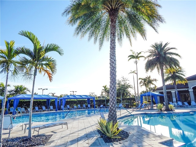 view of pool with a patio area and a gazebo