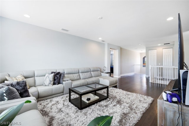 living room with dark wood-type flooring