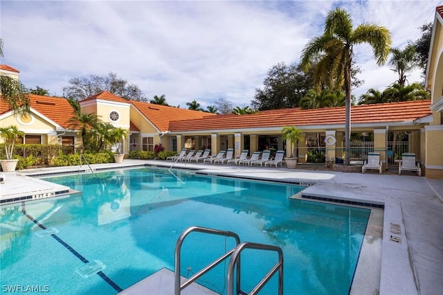 pool featuring a patio area