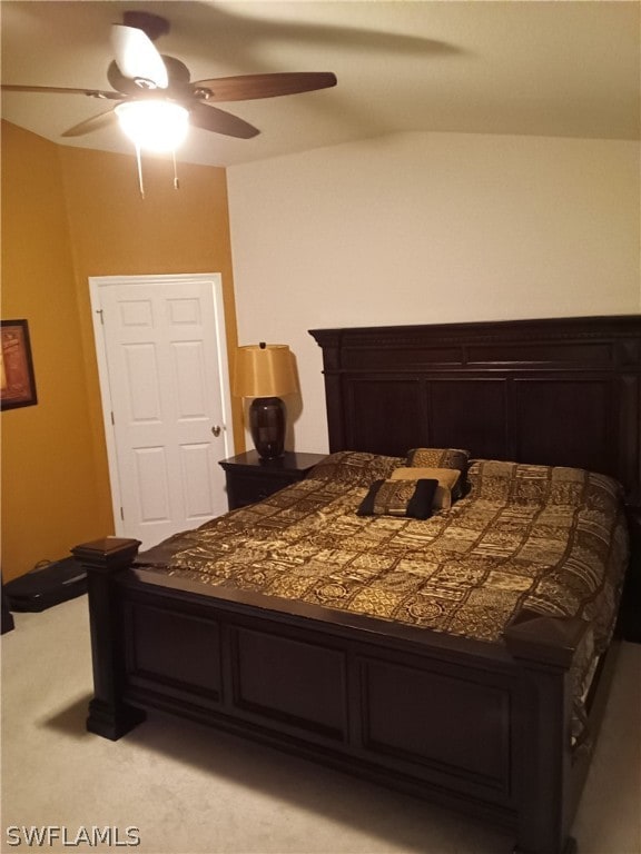 bedroom featuring light carpet and ceiling fan