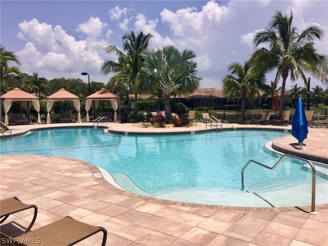 view of pool featuring a patio and a gazebo