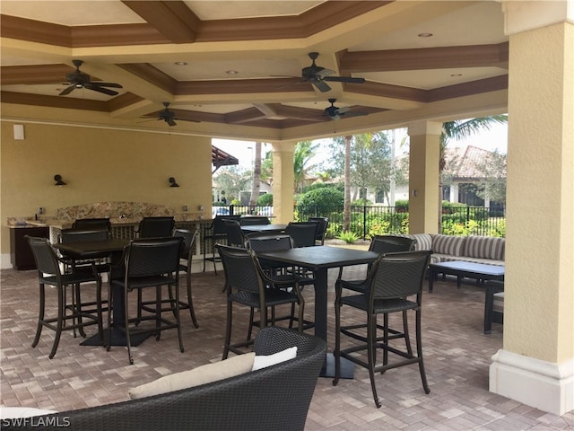 view of patio / terrace featuring ceiling fan