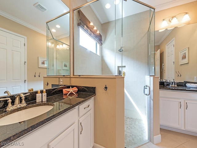 bathroom with tile patterned flooring, vanity, walk in shower, and crown molding