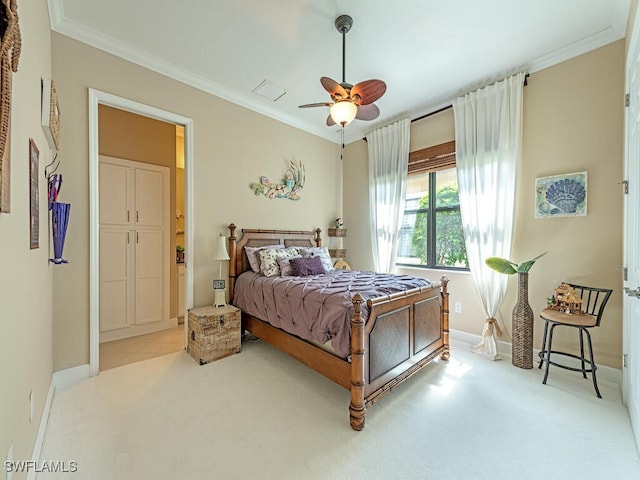 carpeted bedroom with ceiling fan and crown molding