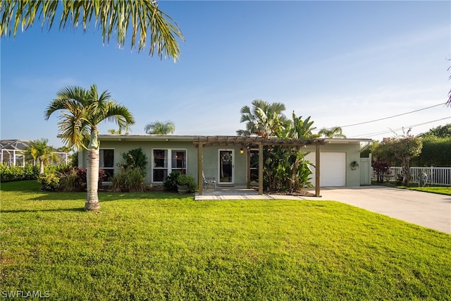 ranch-style home with a front lawn and a garage