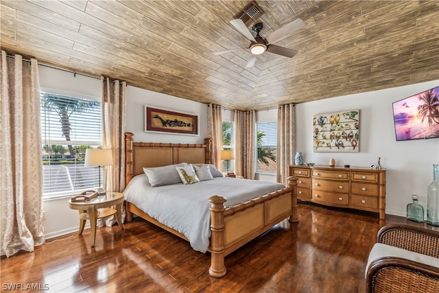 bedroom with dark wood-type flooring and ceiling fan