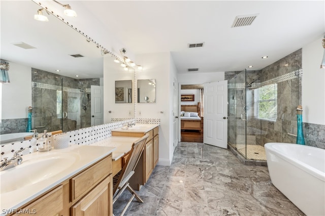 bathroom featuring independent shower and bath, dual bowl vanity, and tile flooring