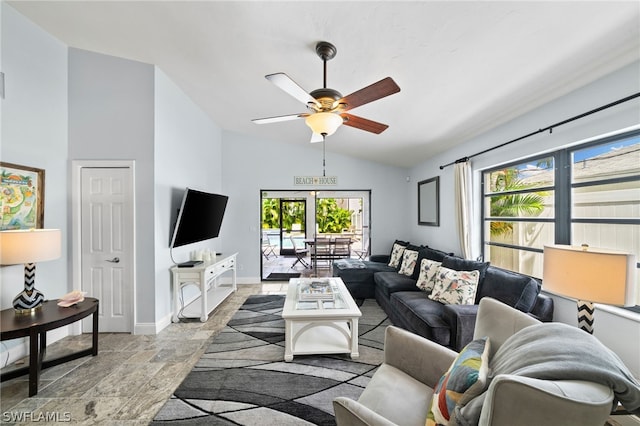 living room with ceiling fan and vaulted ceiling