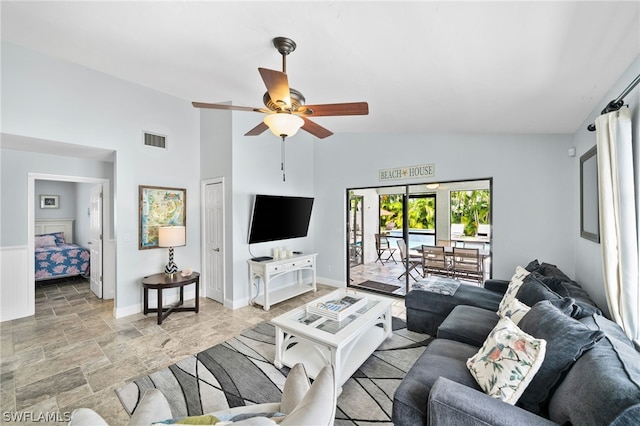 living room featuring high vaulted ceiling and ceiling fan