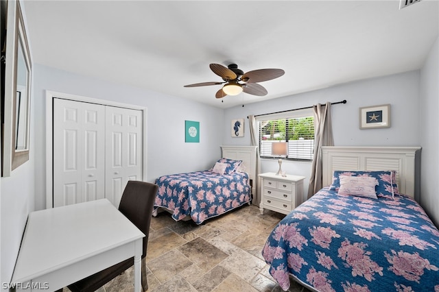 bedroom featuring a closet and ceiling fan