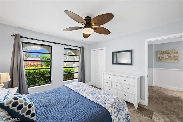 bedroom featuring a closet and ceiling fan