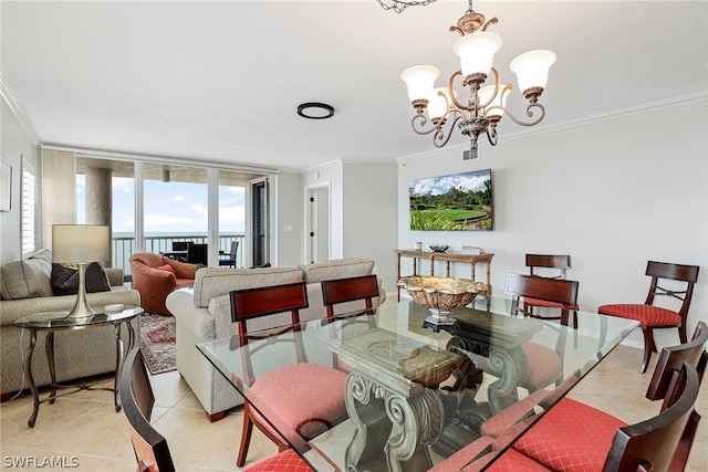 tiled dining area featuring plenty of natural light, a chandelier, and ornamental molding