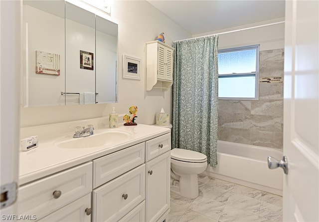 full bathroom with tile floors, toilet, vanity, and shower / bath combo with shower curtain