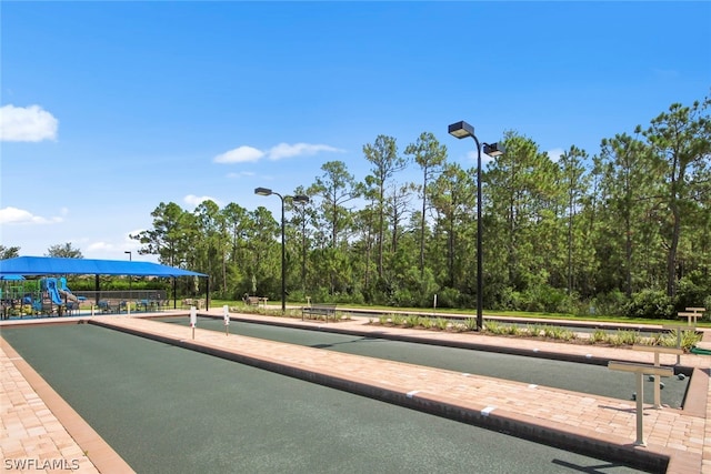 view of home's community with a playground