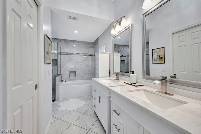 bathroom featuring vanity and separate shower and tub