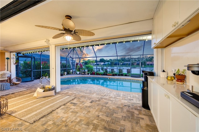 view of pool with ceiling fan