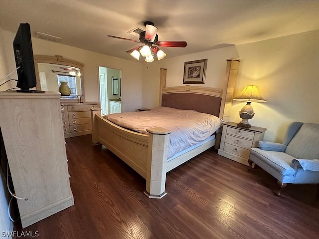 bedroom featuring connected bathroom, ceiling fan, and dark hardwood / wood-style floors