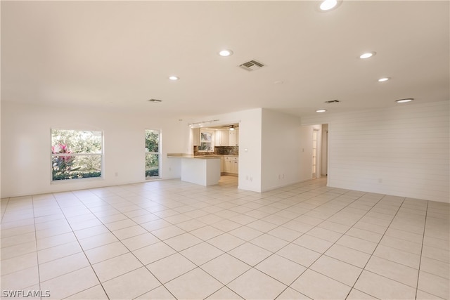 view of tiled spare room