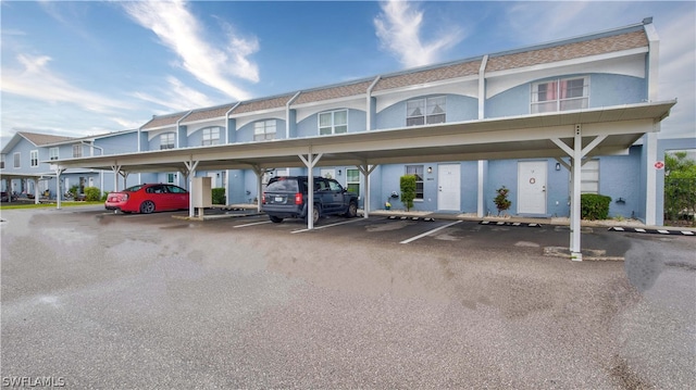 4514 SW 8th Pl Unit 11, Cape Coral, FL 33914 - exterior space featuring a carport