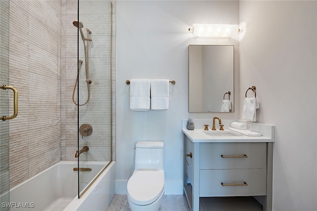 full bathroom featuring shower / bath combination with glass door, toilet, and vanity