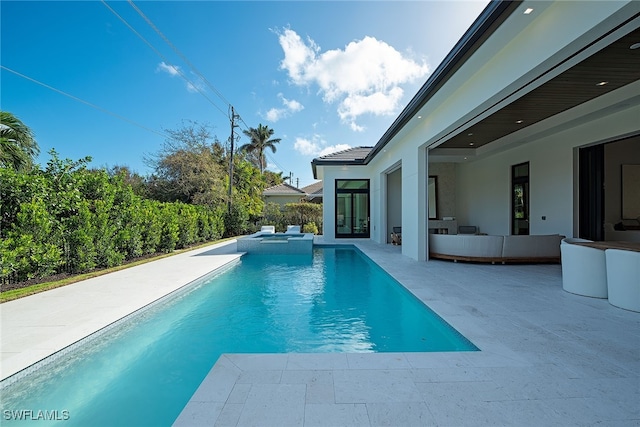 view of pool with a patio area