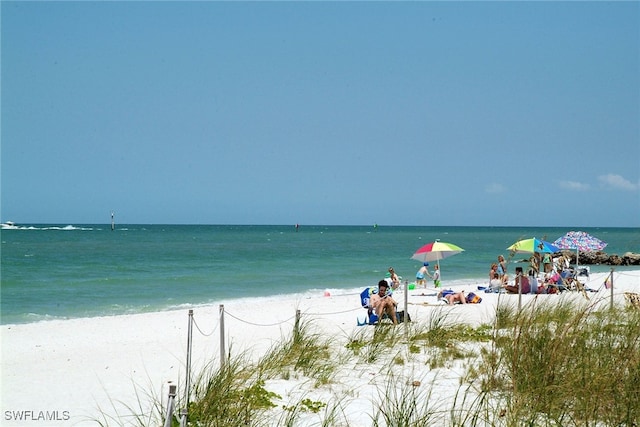 property view of water featuring a beach view